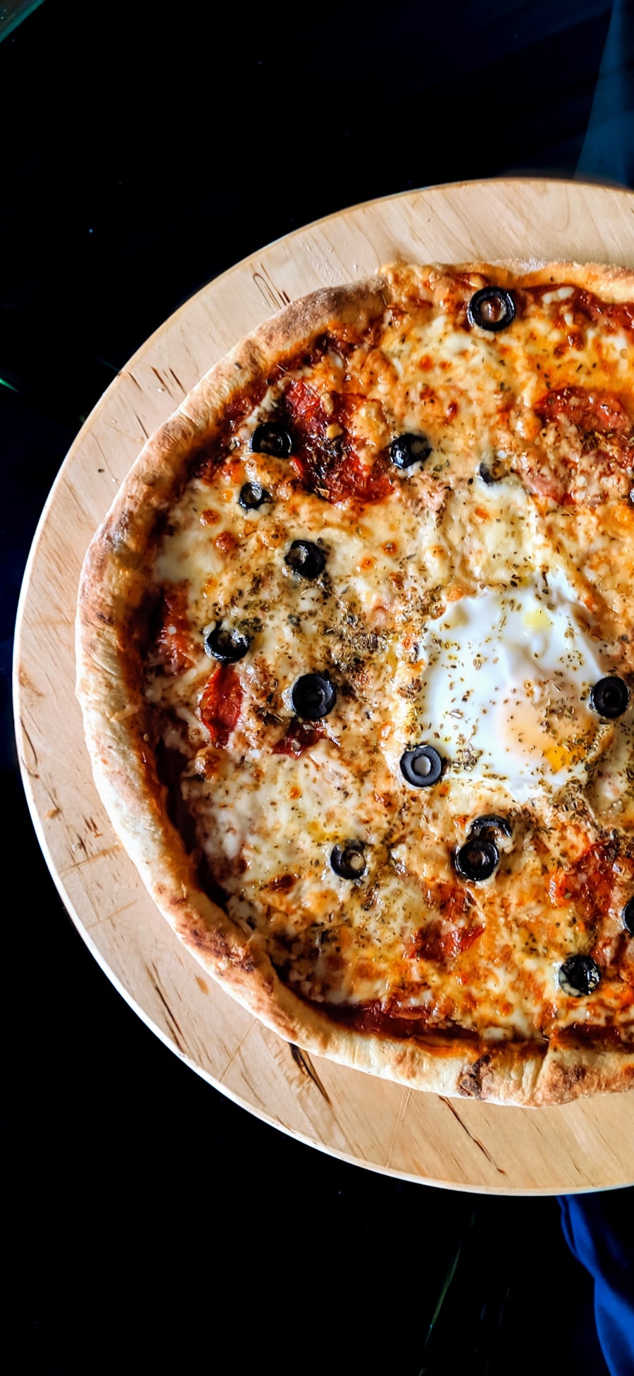 Pizza im lodernden Holzofen
